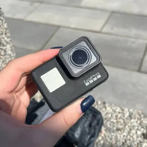 Экшн-камера GoPro Hero 7 Black с триподом