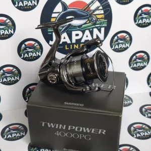 Рибальські котушки Shimano Twin Power 24 та Daiwa Luvias PC