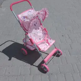 Іграшковий візочок для ляльок