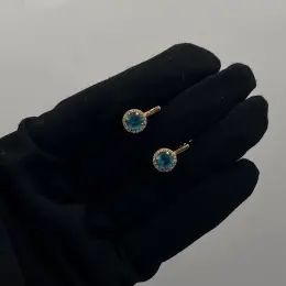 Золотые серьги с голубым камнем и фианитами 3.11 г