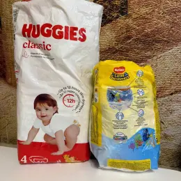 Подгузники Huggies Classic (20 шт) и трусики для плавания Huggies Little Swimmers (8 шт)