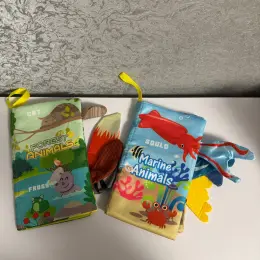 Розвиваючі тактильні книжки-шуршалки та іграшки для немовлят