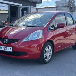 Honda Jazz III покоління 2010 Бензин 1.2 л. Червоний