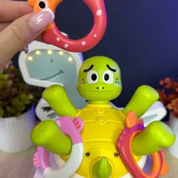 Игрушка для ванны "Черепашка" с фонтанчиком и колечками
