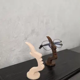 3D-печатная подставка для очков в форме абстрактного профиля лица