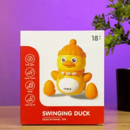 Музична іграшка-каченя "Swinging Duck" YL 503, що рухається та співає