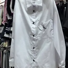 Базова сорочка oversize білого кольору з котону для дівчинки-підлітка