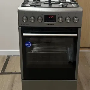 Продам Комбіновану Газову Плиту Б/у Hansa FCMS582258.Нержавійка