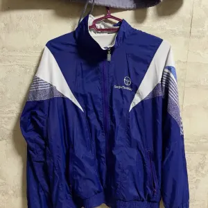 Очень винтажная ветровка Sergio Tacchini M-L