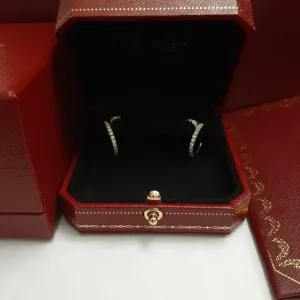 Серьги Cartier Juste un clou с бриллиантами 1,02ct .