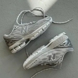 Оригинал New Balance 1906w Silver Metallic (U1906WFE) летние женские кроссовки серие ню беланс