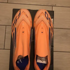 Бутси adidas F50 Elite AG - помаранчевий