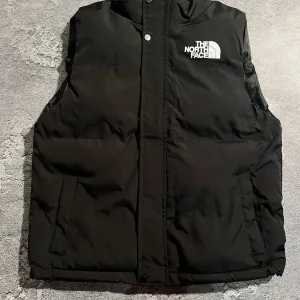 Жилетка tnf / безрукавка тнф / желетка тнф