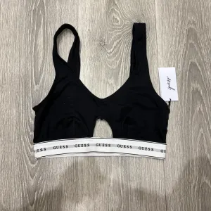 Жіночій топ від Guess , у чорному кольорі , в розмірі М