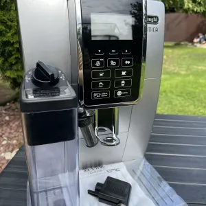 Кавоварка DeLonghi Dinamica з Німеччини провірен