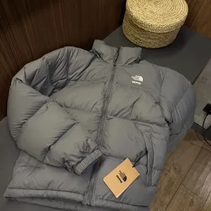 Лімітований пуховик з колаборації SKIMS x The North Face Axel Arigato