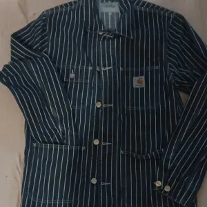 Оригінальна куртка Carhartt WIP Trade Michigan Coat (Hickory Stripe)