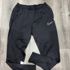 Спортивні штани Nike Dri-Fit , у чорному кольорі , в розмірі М-L