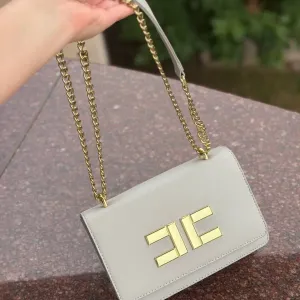 Нова сумка клатч через плече / на плече з біркою