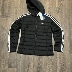 Жіноча куртка adidas оріг нова