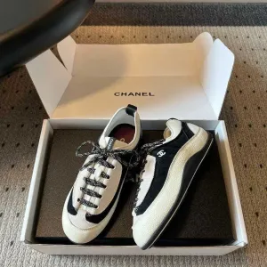 Жіночі кросівки Chanel 26SS чорно-білі шкіряні в стилі ретро натуральна шкіра 39 р