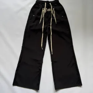 Штани оверсайз клеш y2k opium swag archive