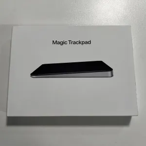5750->Magic Trackpad (USB‑C) Black (MXKA3)