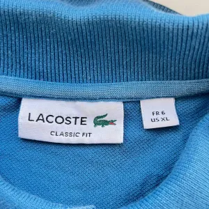 Поло LACOSTE нове