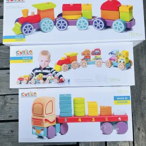 Дерев'яна іграшка  сортер Cubika Поїзд Веселковий, тягач з геометр.фігурками