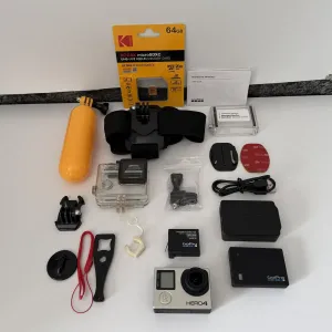 GoPro HERO 4 Black якісна екшн камера для спорту роботи хоббі відео з кріпленням флешкою аквабоксом