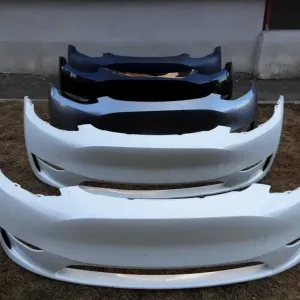 Бампер передній Tesla Тесла model Y 2023-2024 без отворів парктроніків