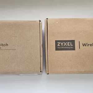 Комутатор Zyxel MG-105 (Zyxel Switch MG-105) та Нова бездротова точка доступу Zyxel Wireless LAN Zyxel NWA50AX.