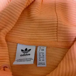 Толстовка adidas жіноча S/M помаранчева