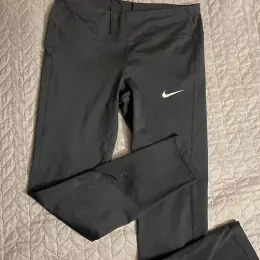 Лосини Nike жіночі сірі розмір M